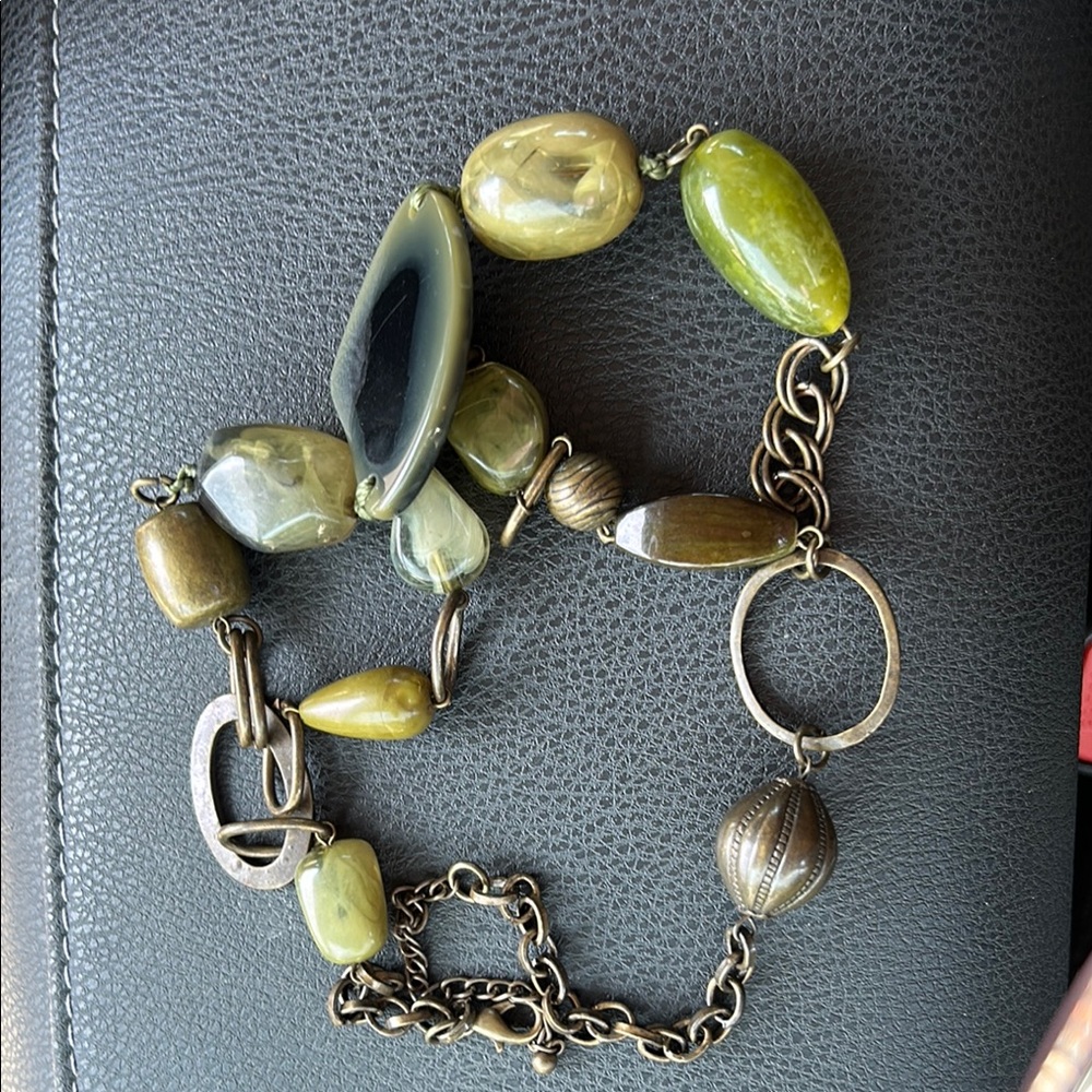 Green and Gold Statement Necklace with Intricate Detailing